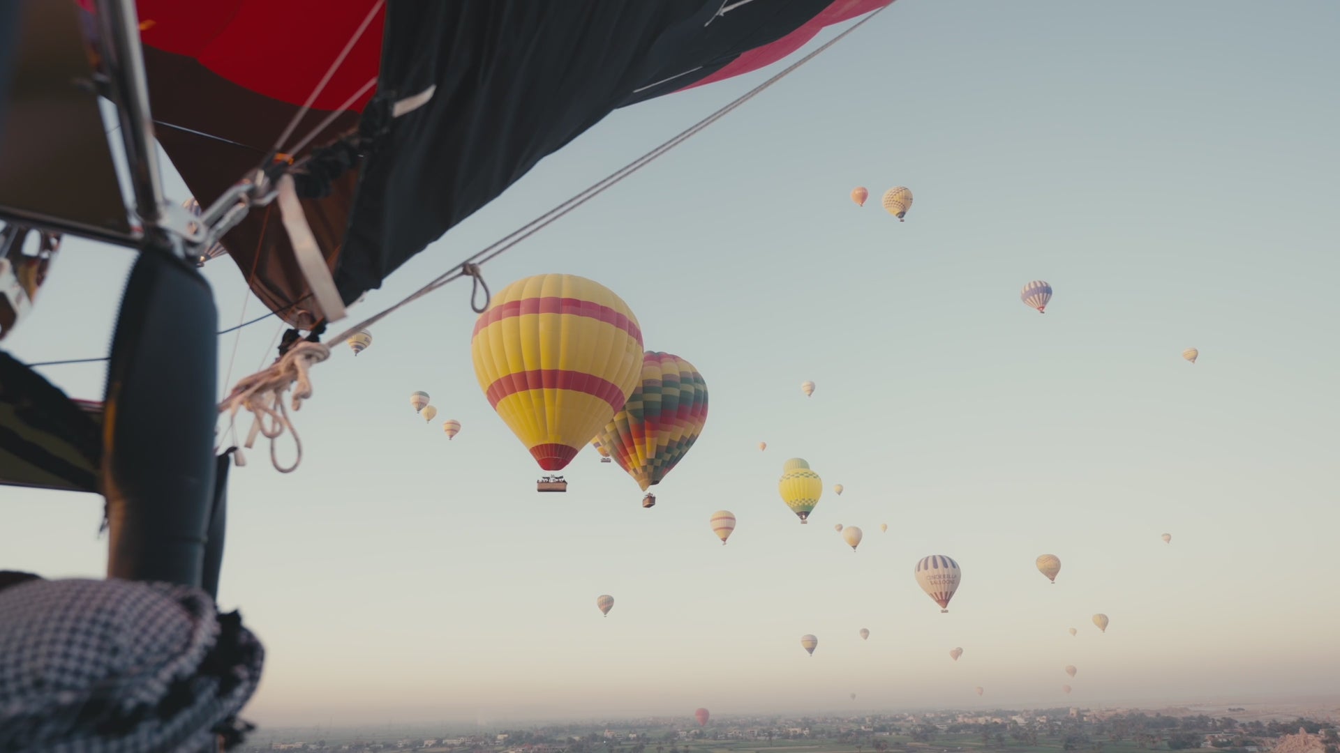 Load video: Stamps Tours sizzle reel featuring retreats, group tours, luxury tours, and events in Egypt, such as hot air balloon rides, meditation classes, yachting, and other adventures